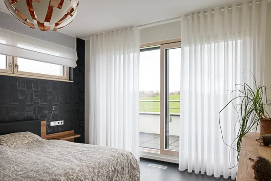 Réalisation rideaux sur mesure de Buedemleër