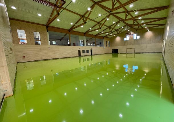 Hall de sport à Feulen, 1ère couche de PU coulé